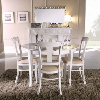 Tavolo rotondo allungabile in legno bianco ambientato