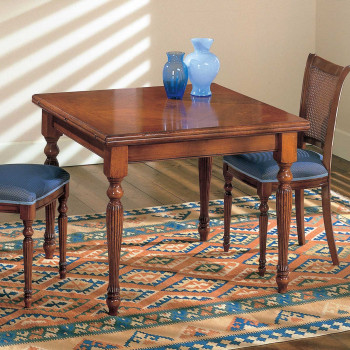 Tavolo a libro intarsiato in legno di noce con gambe tornite