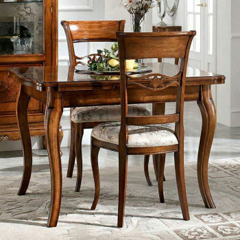 Tavolo quadrato con intarsio iris allungabile in legno massello, ambientato