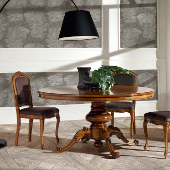 Tavolo Iris con intarsio e gambone centrale finemente intagliato