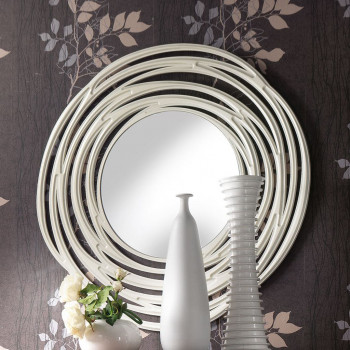 Specchiera rotonda traforata a vortice, dettaglio cornice