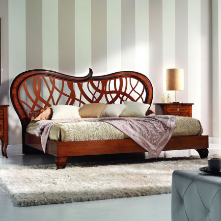 Letto 'Elegant' testata traforata dettagli intagliati
