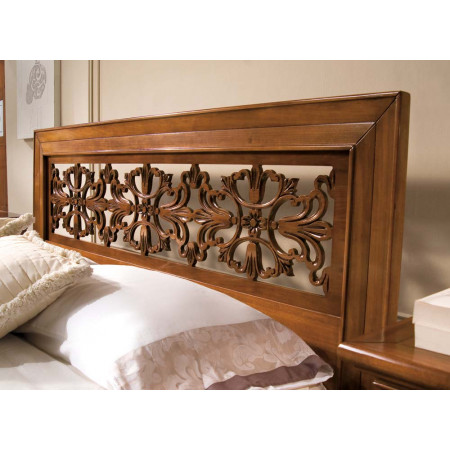 Letto intagliato a mano con testata floreale in legno