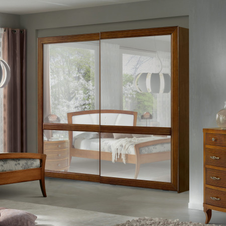 Camera da letto Sole con riflesso su armadio a specchio