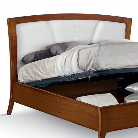 Letto matrimoniale in legno con testata imbottita e contenitore aperto