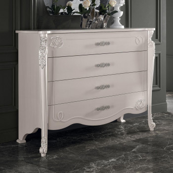 Comò stella con spalle intagliate e dettagli in rilievo