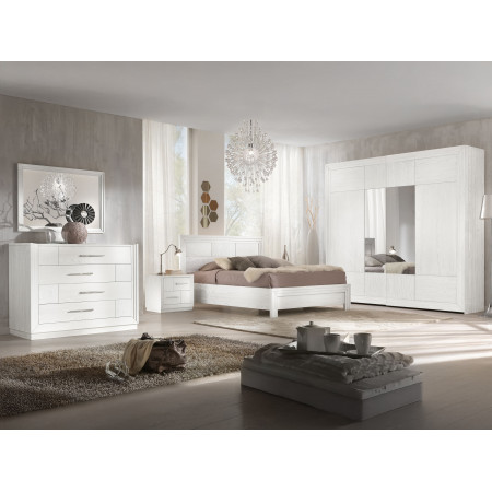 Comodino con due cassetti con zoccolo in ambiente