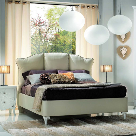 Letto imbottito con contenitore, dettagli piedini intagliati
