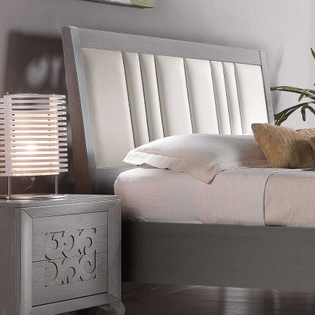 Letto a due piazze imbottito, testata in ecopelle