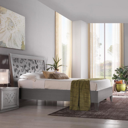 Letto a due piazze testata traforata design moderno