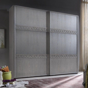 Armadio due ante scorrevoli in legno con fasce traforate