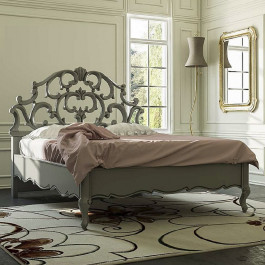 Letto barocco con testata intagliata, particolare Letto barocco con testata intagliata, dettaglio in legno