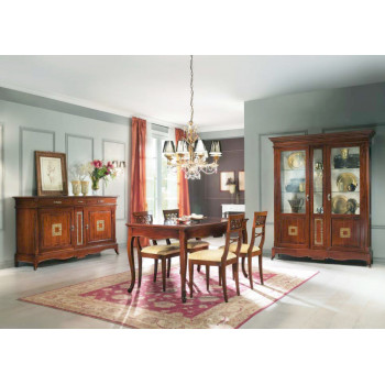 Sala da pranzo con trafori, tavolo e sei sedie legno