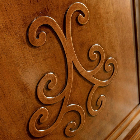 Decorazione rilievo su Composizione Puccini in legno di noce