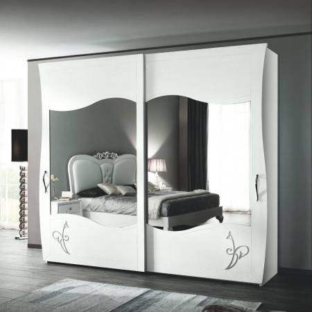 Letto sagomato con giroletto contenitore, testata ecopelle