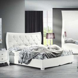 Letto sagomato imbottito capitoné con struttura in legno