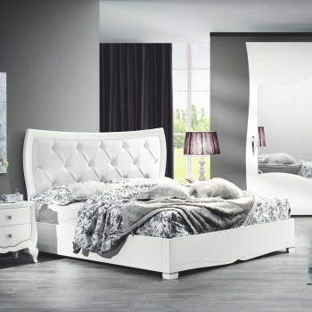 Letto sagomato imbottito capitoné con struttura in legno