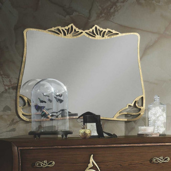 Specchiera traforata con effetto floreale, dettagli cornice