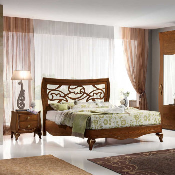 Letto traforato e sagomato con testiera floreale