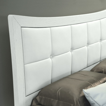 Letto imbottito con contenitore, dettaglio testata in ecopelle bianca