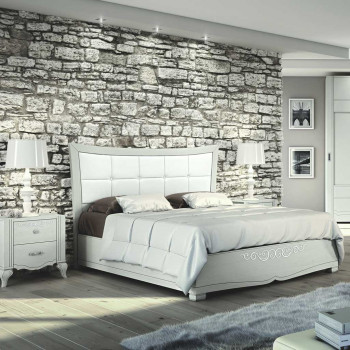 Letto imbottito con pediera decorata e testata ecopelle