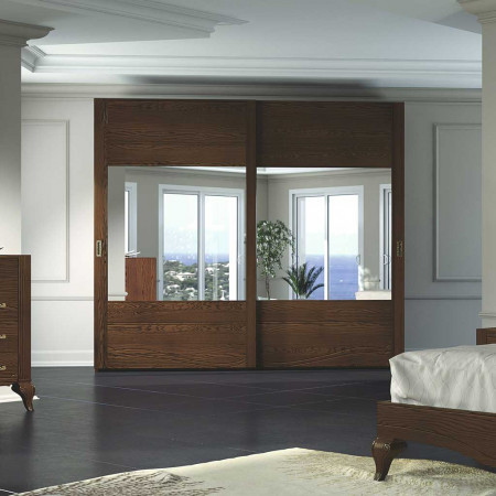 Camera in stile classico contemporaneo, dettaglio legno massello, letto imbottito