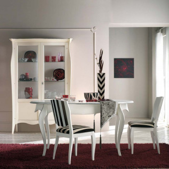 Tavolo da pranzo ovale allungabile ambientato con dettagli