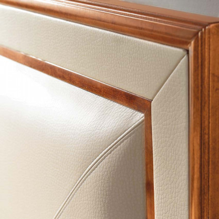 Letto con testata ecopelle dettaglio cornice legno