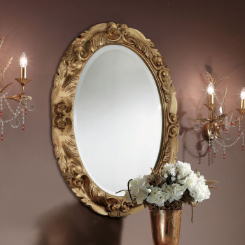 Specchiera ovale foglia similoro con cornice intagliata