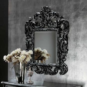 Specchiera barocca intagliata con cornice scura