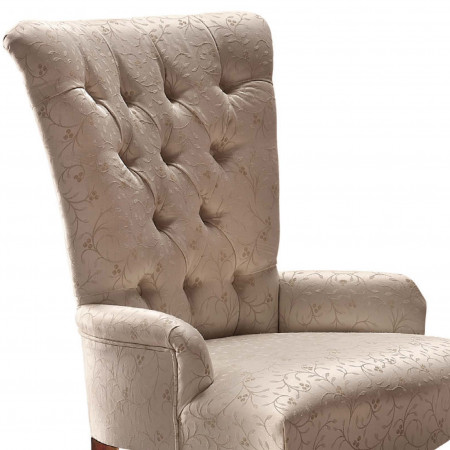 Poltroncina capitonnè con dettaglio tessuto