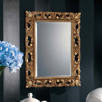 Specchiera lavorata con foglia oro, dettaglio intagli