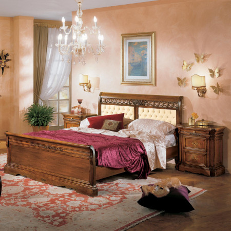 Letto con pannelli in ecopelle capitonè e legno toulipier
