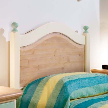 Testiera in legno massello di abete con dettagli colorati
