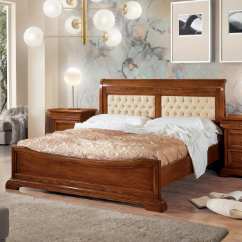 Letto matrimoniale Edera con testata capitonne intagliata con giroletto