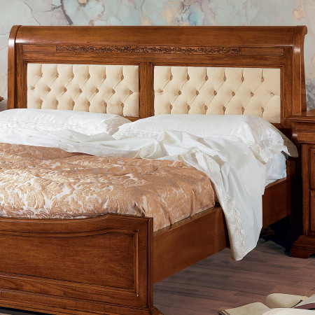 Letto matrimoniale Edera con testata capitonne intagliata con giroletto