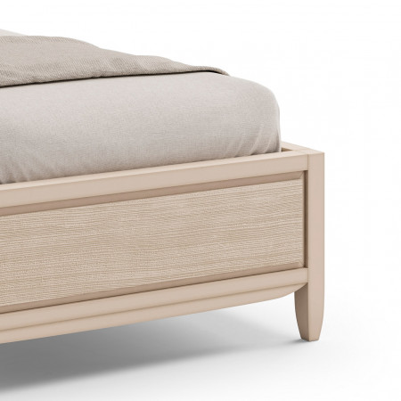 Letto singolo con testata imbottita, dettaglio pediera