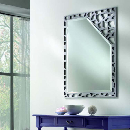Specchio moderno di design con cornice traforata
