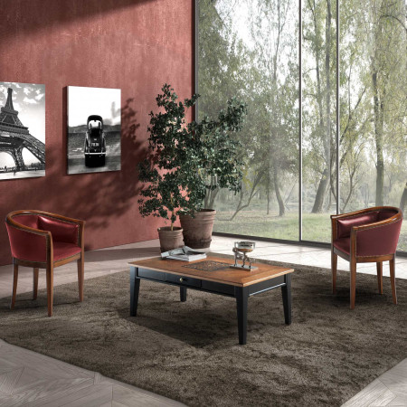 Poltroncina a pozzetto in legno, dettagli pelle e borchie