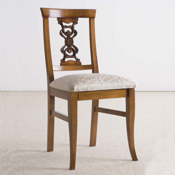 Sedia imbottita con fondo in tessuto, schienale intagliato