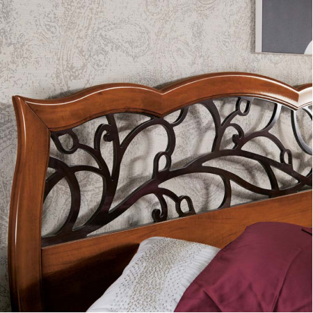 Letto traforato con testata floreale in legno moka