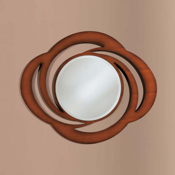 Specchiera Tornado con cornice sagomata in noce