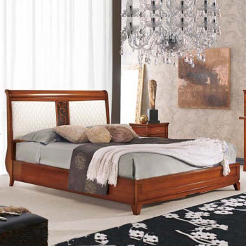 Letto con piedini in legno massello, testata sagomata
