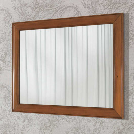 Comodino 2 cassetti con intaglio accanto a letto