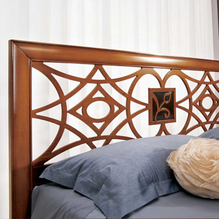 Testata letto disegno geometrico legno massello