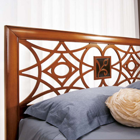 Testata letto disegno geometrico in legno massello