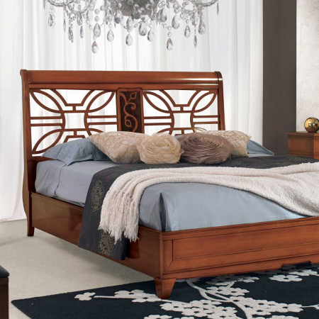 Letto Quadrifoglio in legno con testata traforata