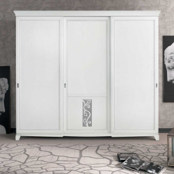 Armadio con anta centrale ornata, dettaglio floreale