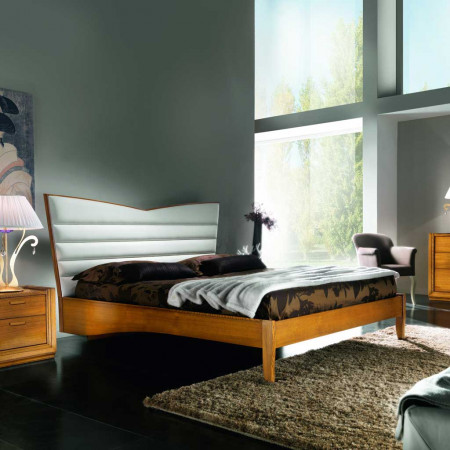 Camera da letto in stile classico contemporaneo con testata imbottita