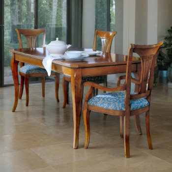Tavolo rettangolare fisso 140x90 con sedie classiche ambientato